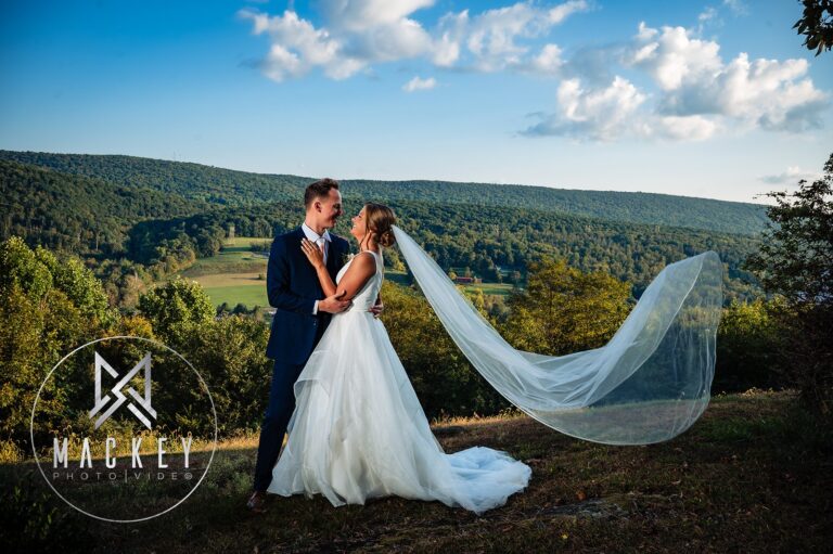 Bride and groom embrace at Ridgecrest overlook